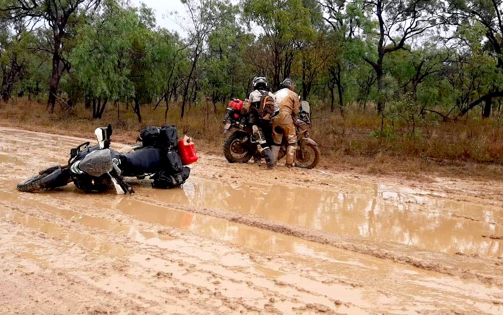 Adventure riders helping each other